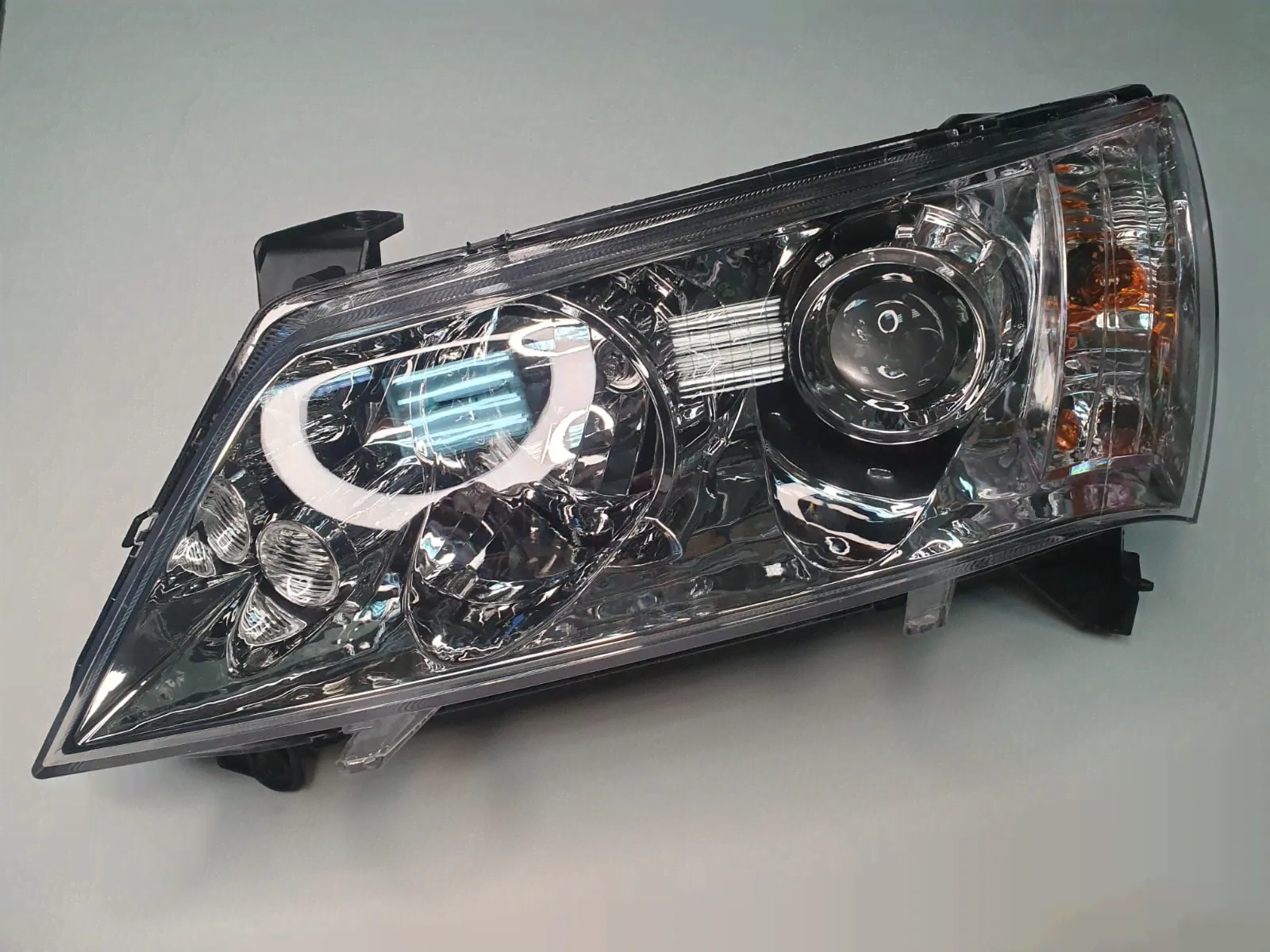 Фара левая Geely Emgrand EC7 1.8 16V CVT седан 1067001211-0